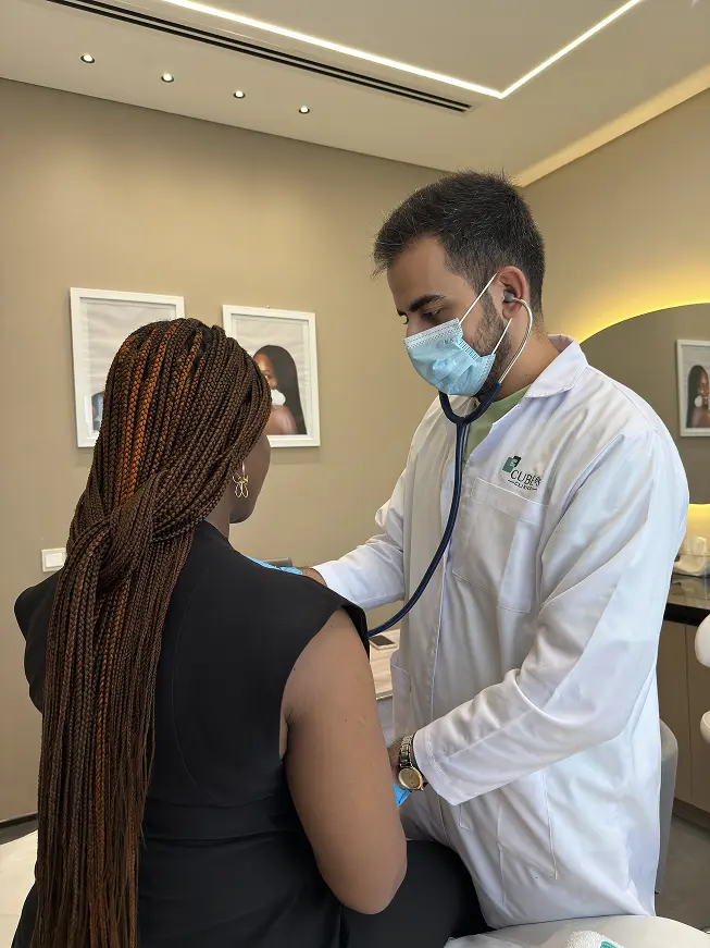 A Cube65 clinic specialist consulting with a patient